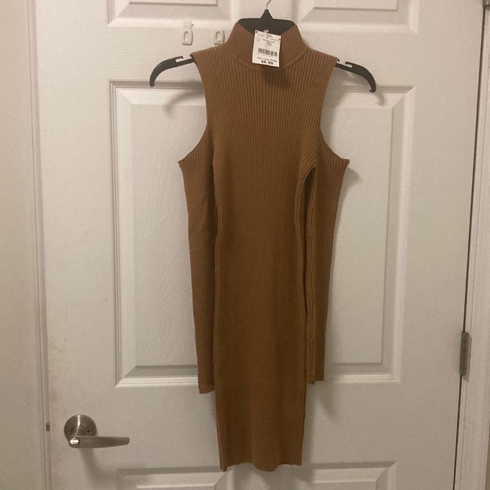 Long sleeve dress. Cut out shoulder. Stretch material. Color is nude. Size small